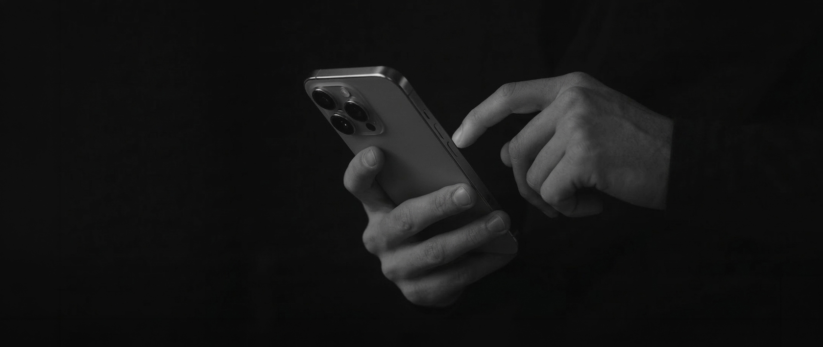 man with an iphone 12 touch screen